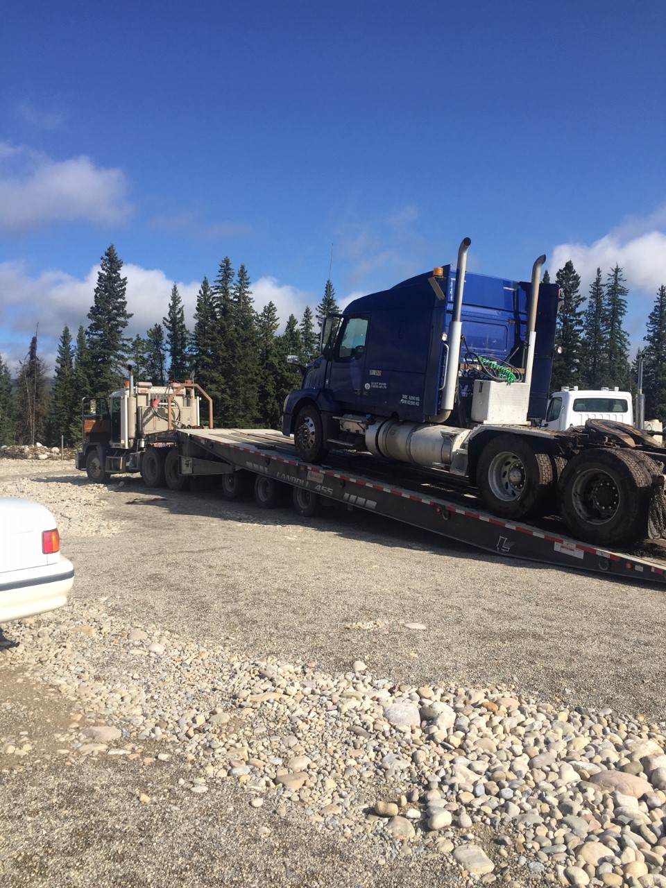 Loading a truck with mechanical problems for a trip to the city.